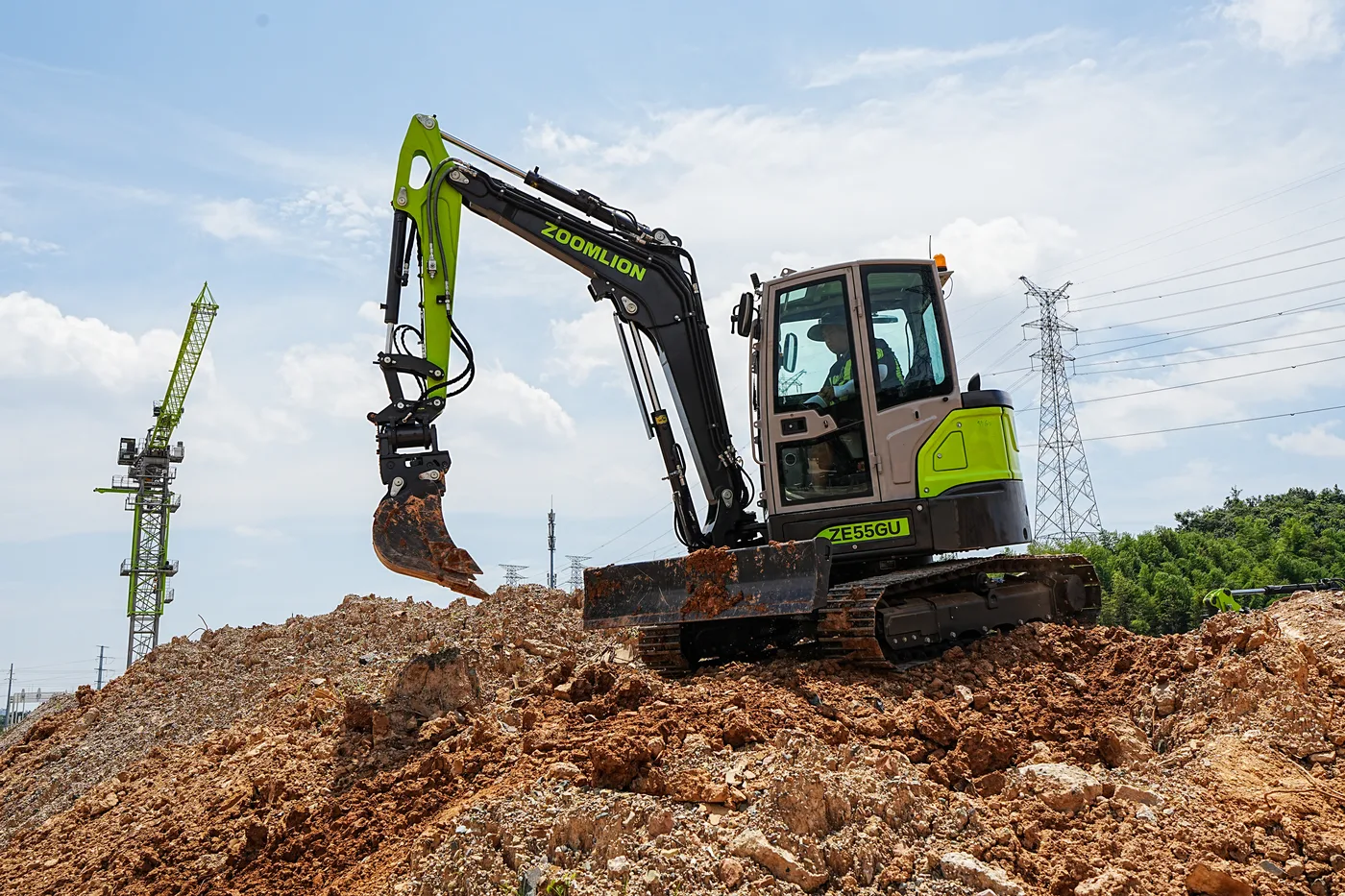 Zoomlion ZE55GU excavator digging on a construction site